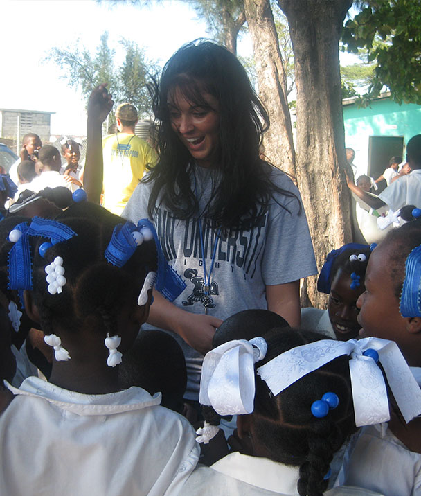 Britney with children in Haiti